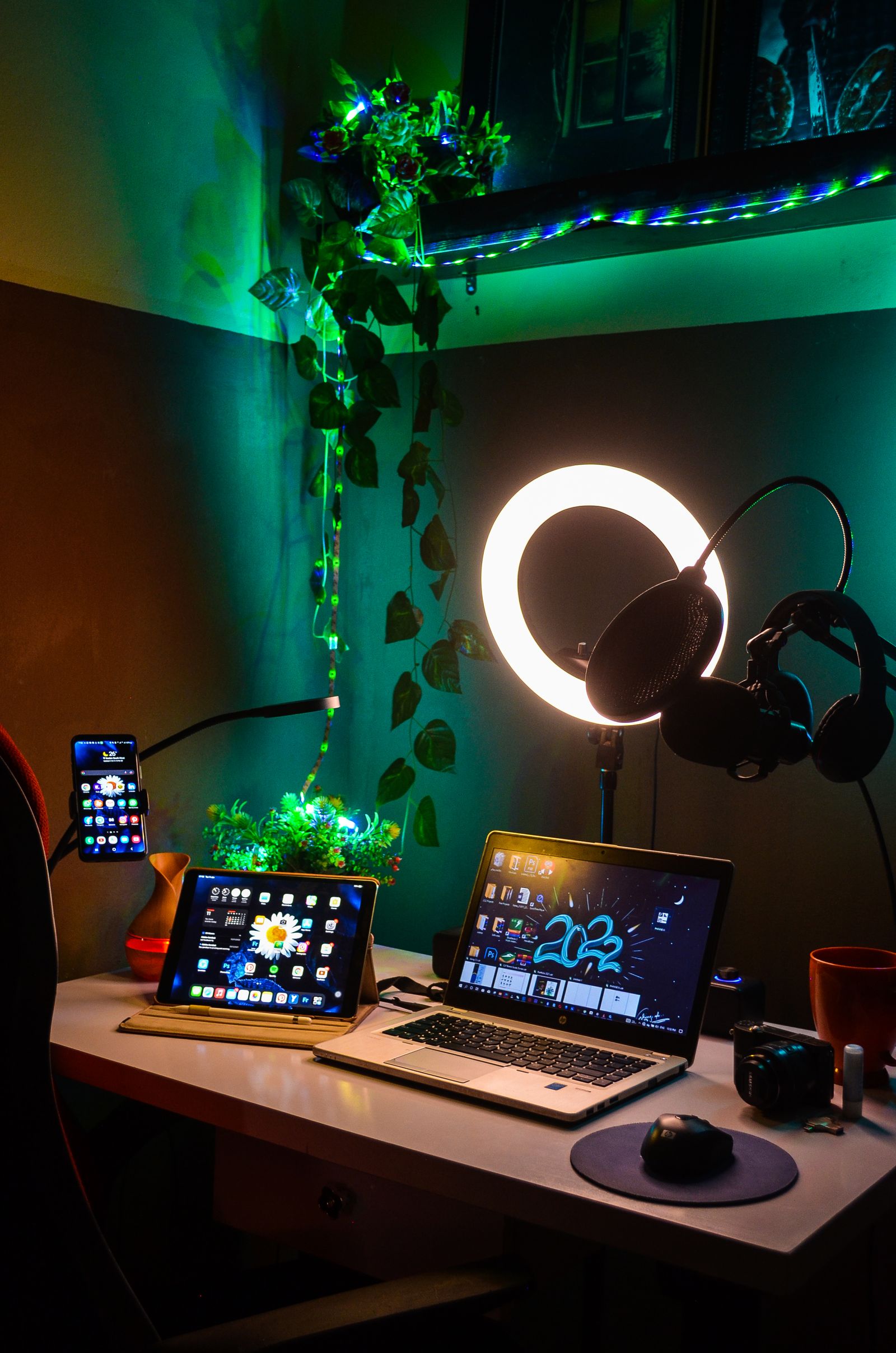 Laptop, tablet and smartphone arranged in a multi-device setup
